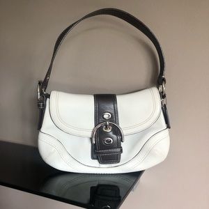 Small handbag saddlebag flap over white leather